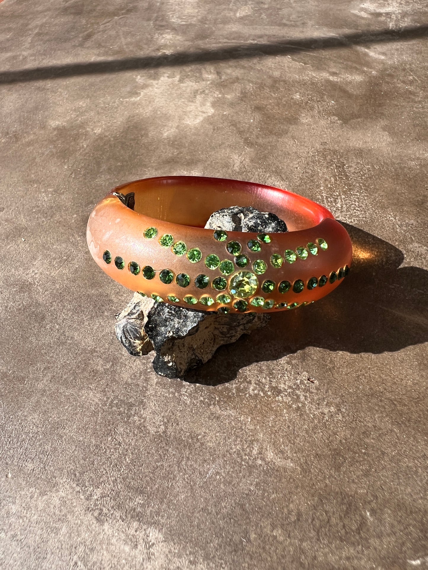 1950s Amber Lucite Clamped Bangle with Green Rhinestones